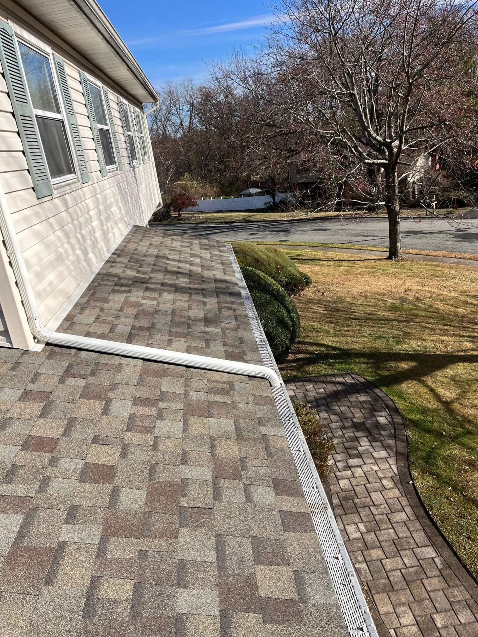 New roof installation showcasing quality materials and craftsmanship by On Time Roofing, enhancing home exterior.