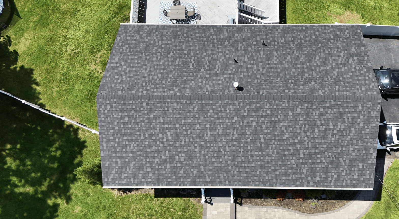 residential top roof view with new shingles roofing